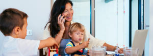 A physician who is on home call spending time with her family